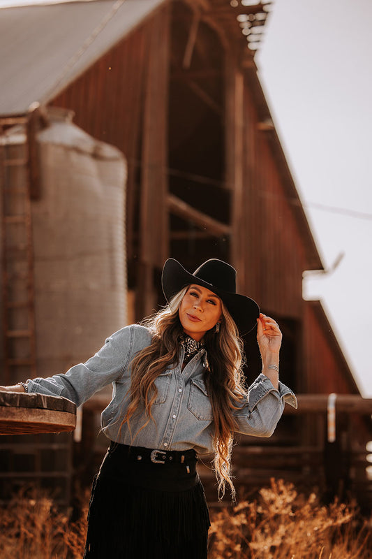 Step into the wild with this Black 6X Felt Seratelli Hat, crafted for those who live the West Desperado spirit. Made with premium 6X felt, it promises durability and a comfortable fit, while its bold black color adds a dash of mystery to your style. Whether you're riding into the sunset or just owning your day, this hat brings classic cowboy charm with a playful twist. Saddle up and wear your adventure!
