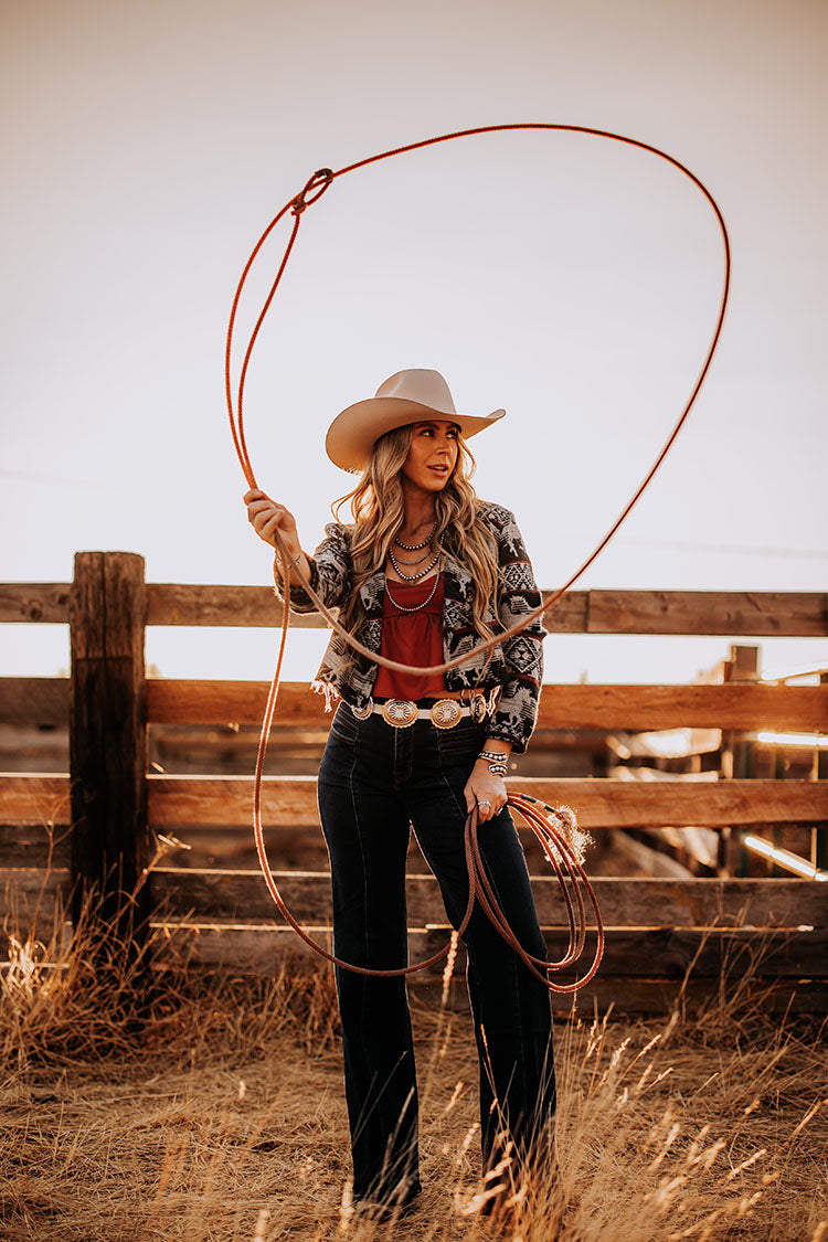 Crafted from 6X fur felt in buckskin, this hat features a 4” wide shovel brim paired with a tall brick crown that measures 4 1/2” tall. The hat is finished with a goat leather sweatband, a polished two tone metal 3-piece buckle set, a matching self-band, and a special edition royal blue satin liner.