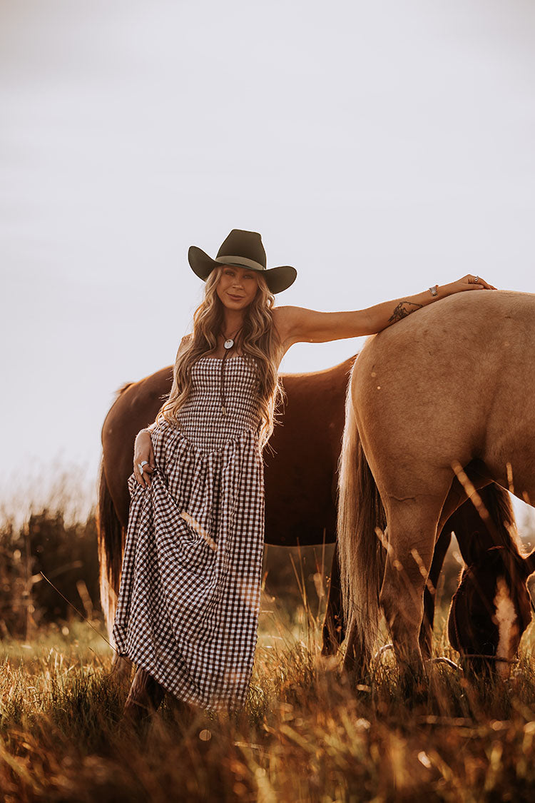 Crafted from 6X fur felt in dark olive, this hat features a 4” wide shovel brim paired with a tall brick crown that measures 4 1/2” tall. The hat is finished with a goat leather sweatband, a polished metal concho set, a silver 7/8 inch ribbon, and a special edition royal blue satin liner.